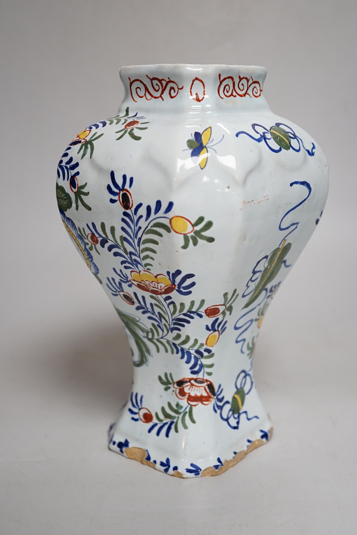 An 18th century Delft polychrome vase, 24cm high